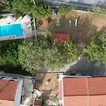 House Runjic With Pool, Large Garden And Playground Prgomet